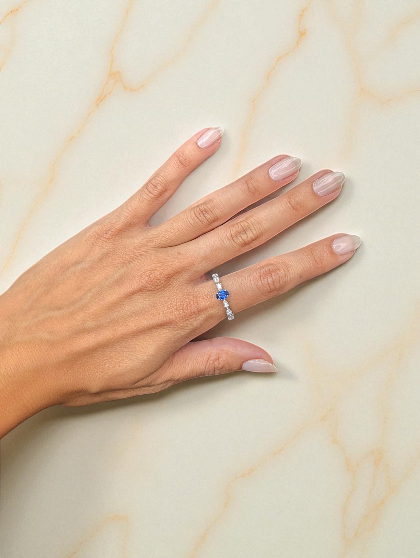 0.63 CT Sapphire and Diamond Ring